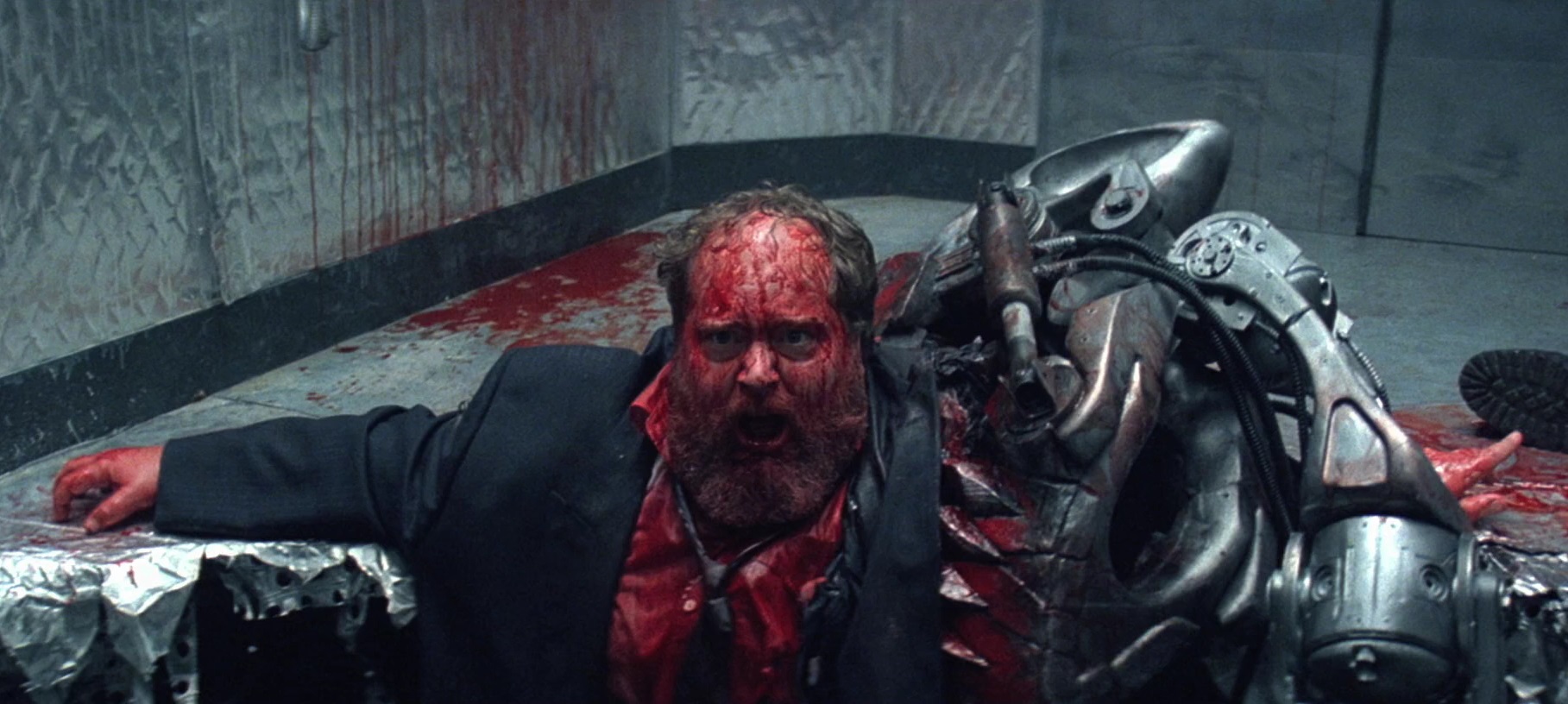 William Hootkins gets devoured by the Warbeast in Death Machine (1995)