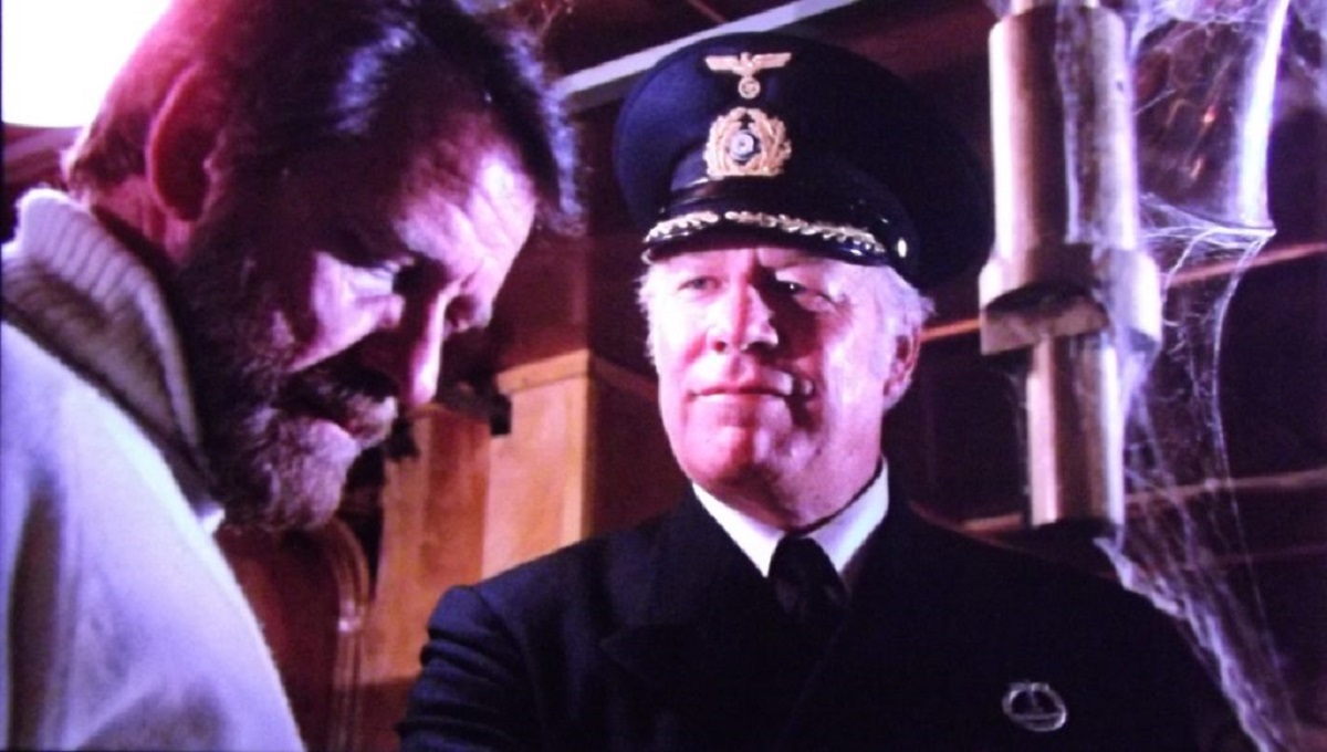 (l to r) Richard Cenna and captain George Kennedy in Death Ship (1980)