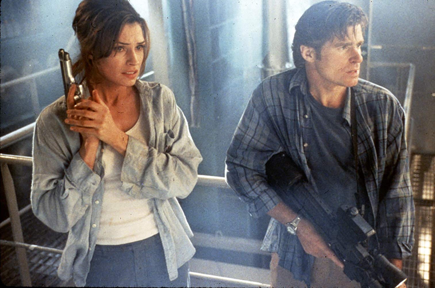Famke Janssen and Treat Williams in Deep Rising (1998)