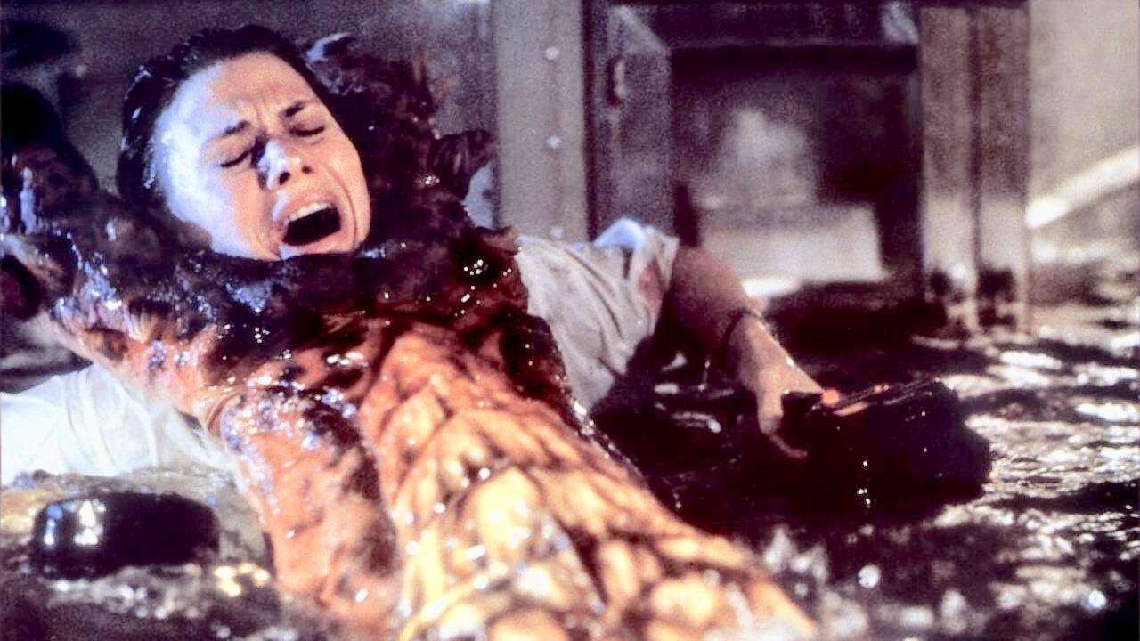 Cindy Pickett under attack by the monster in Deepstar Six (1989)