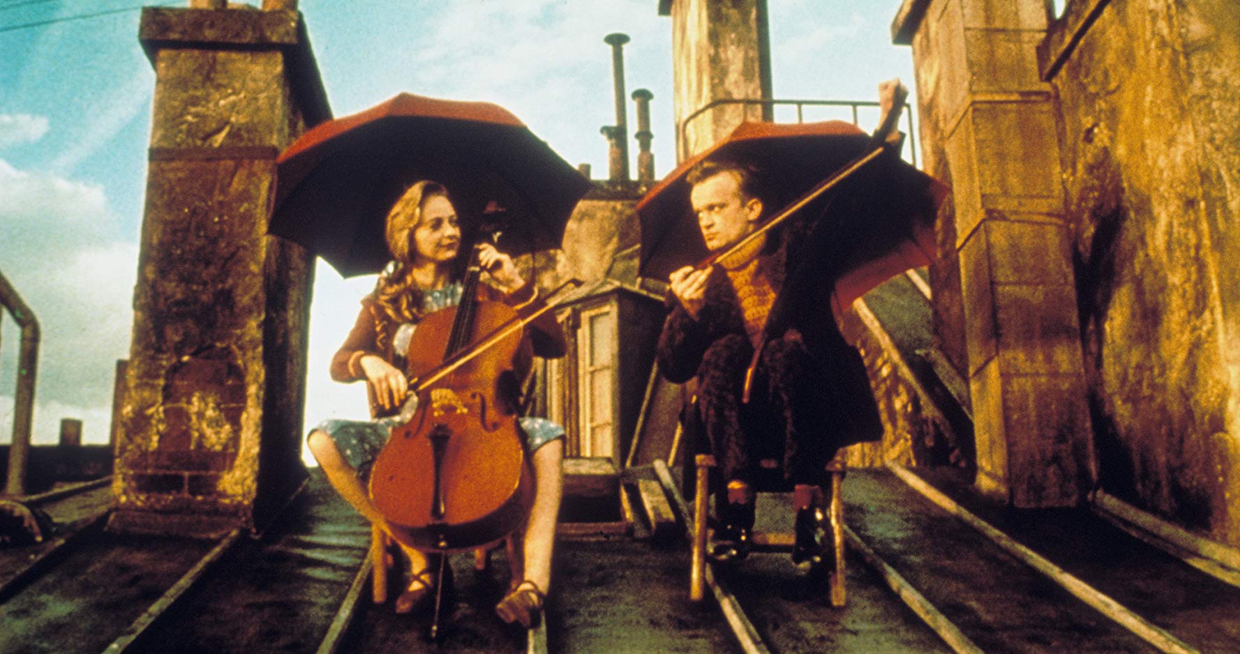 Marie-Laure Dougnac and Dominique Pinon play a rooftop symphony in Delicatessen (1991)