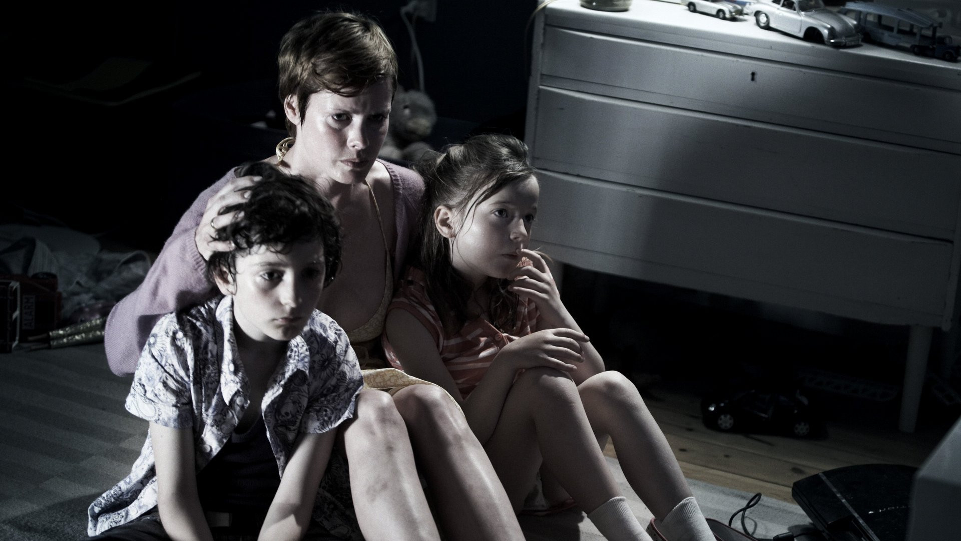 Wife Lenne Nystrøm Rasted shelters inside the house with the children in Deliver Us From Evil (2009)