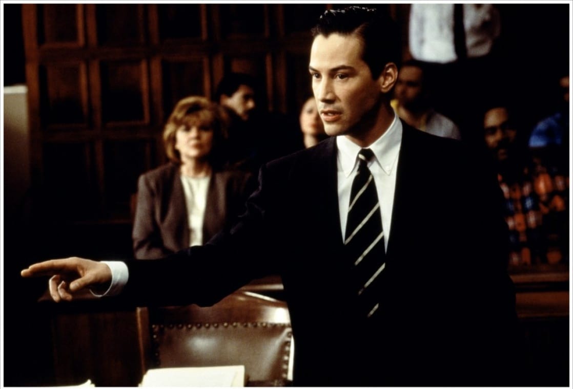 Keanu Reeves as lawyer Kevin Lomax in The Devil's Advocate (1997)