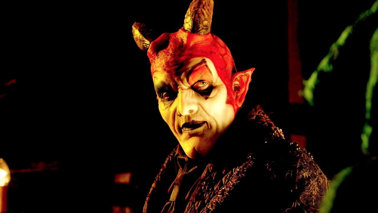 Terrance Zdunich (who writes the screenplay and songs for the film) as The Devil presiding over Hell in The Devil's Carnival (2012)