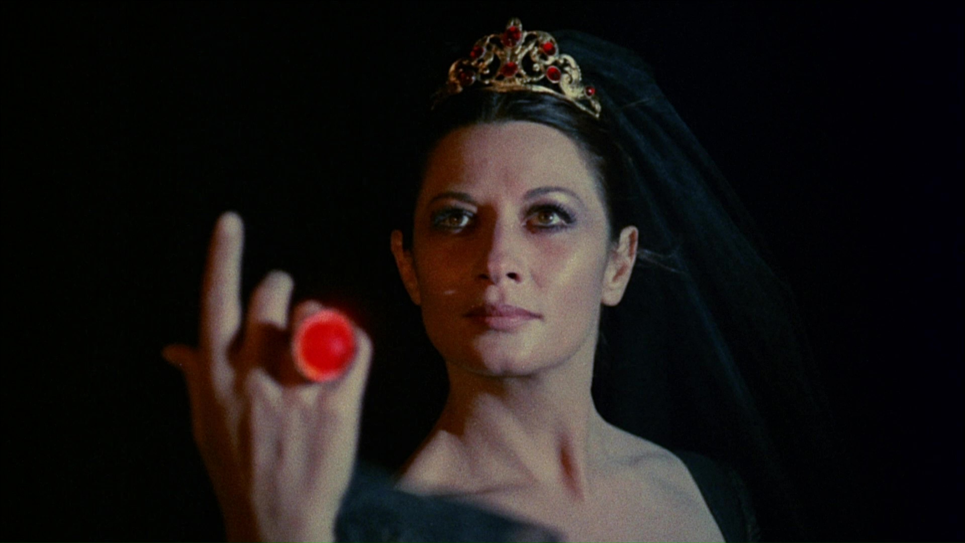 Countess Dolingen de Vries (Sara Bay/Rosalba Neri) wields the Ring of the Niebelungs in The Devil's Wedding Night (1973)