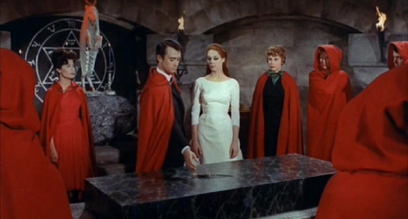 Count Sinistre (Hubert Noel) leads the cult in sacrifice in Devils of Darkness (1965)