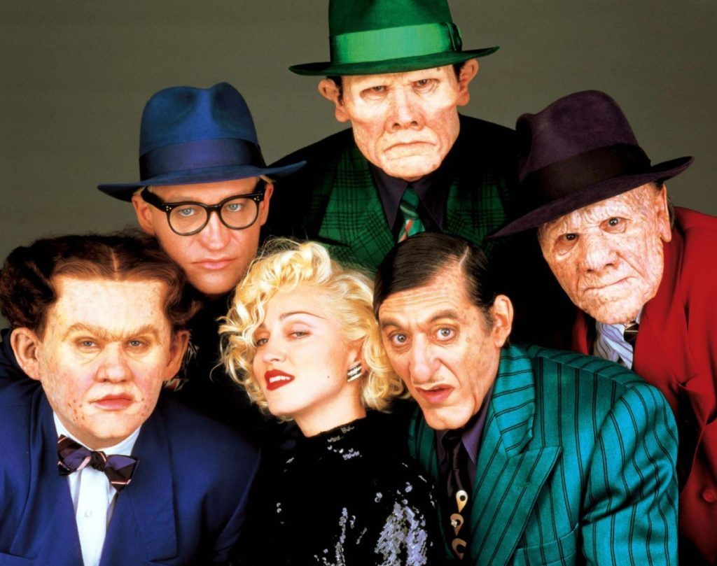 Line up of villains - (clockwise from left) Flattop (William Forsythe), Itchy (Ed O’Ross), Influence (Henry Silva), Pruneface (R.G. Armstrong), Big Boy Caprice (Al Pacino) and Breathless Mahoney (Madonna) in Dick Tracy (1990)