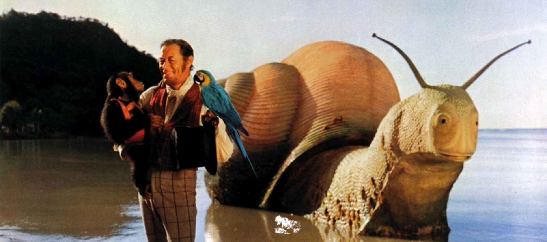 Doctor Dolittle (Rex Harrison) with Chee-Chee the monkey, Polynesia the parrot and the Great Pink Sea Snail in the backgroud in Doctor Dolittle (1967)