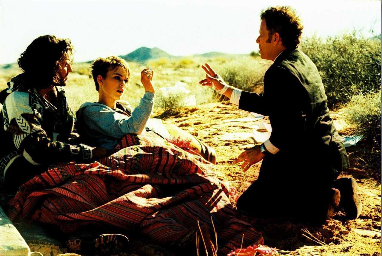 Choco (Edgar Ramirez) and Domino Harvey (Keira Knightley) meet The Wanderer (Tom Waits)