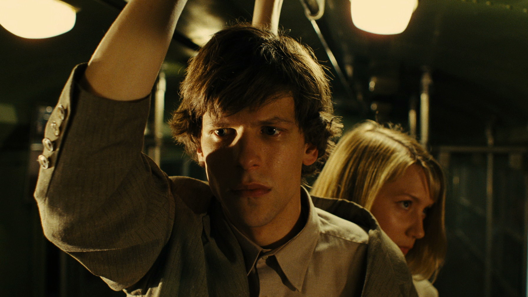 Jesse Eisenberg and Mia Wasikowska in The Double (2013)