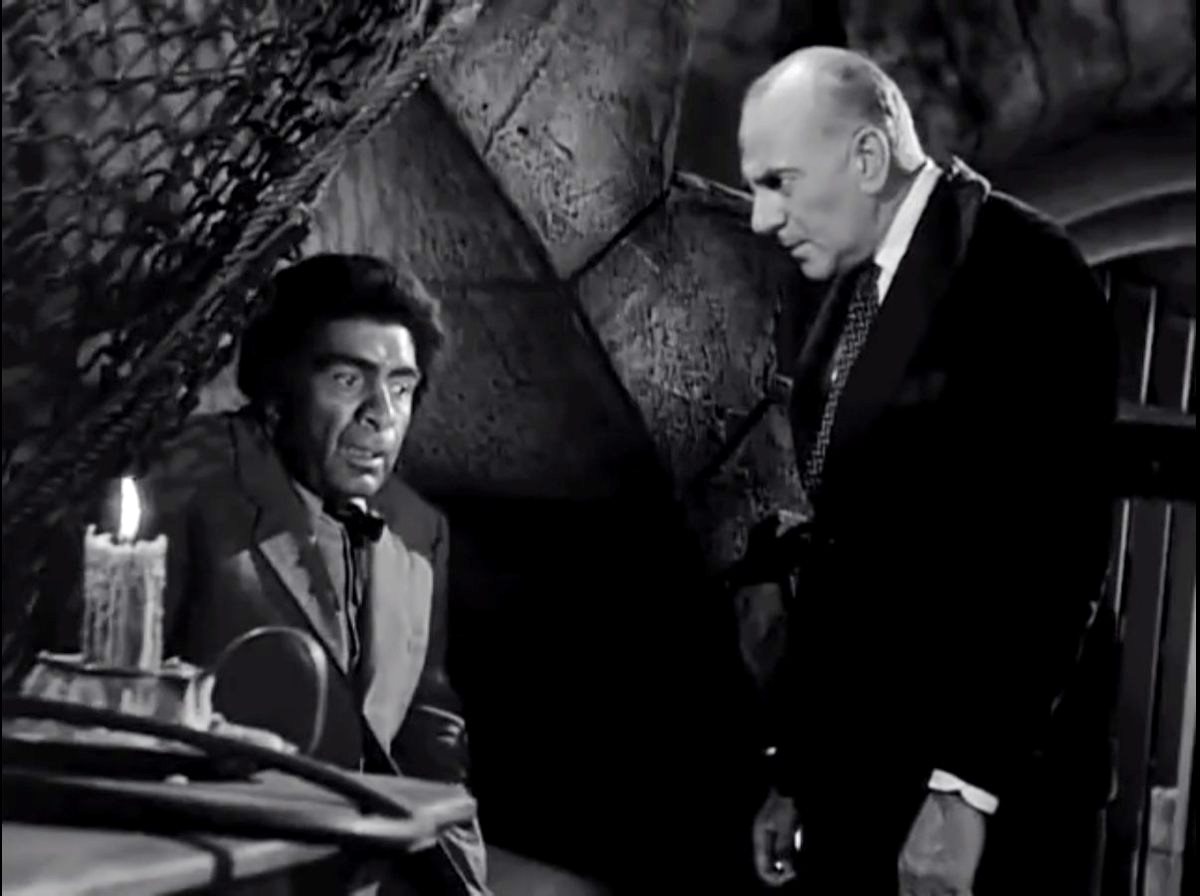 J. Carrol Naish as Noel the ape man and George Zucco as mad scientist Dr Renault in Dr Renaults Secret (1942)