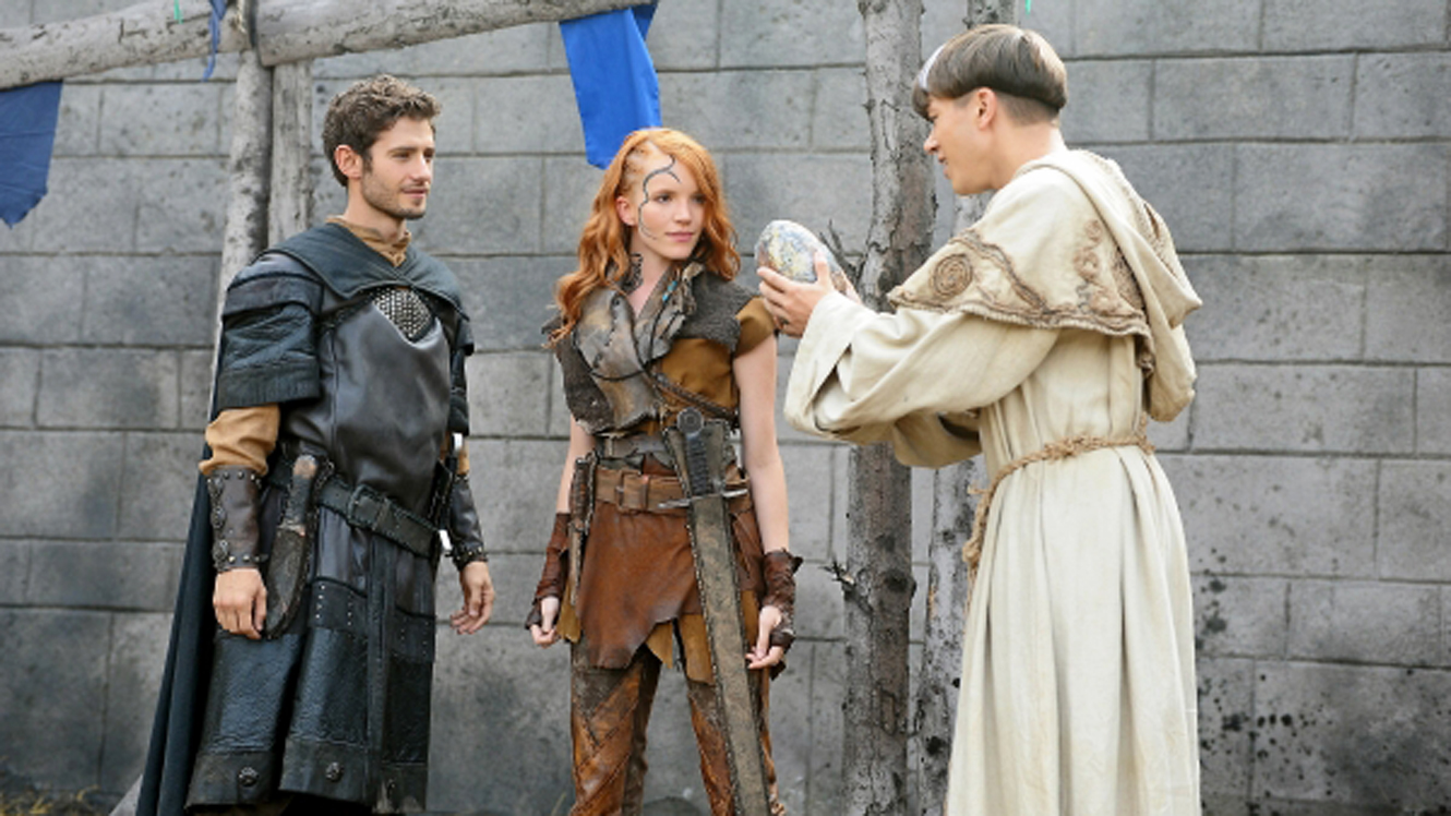 (l to r) Gareth (Julian Morris), Pict girl Rhonu (Tamzin Merchant) as the druid Lorne (Jassa Ahluwalia) shows them a dragon egg in Dragonheart 3: The Sorcerers Curse (2015)