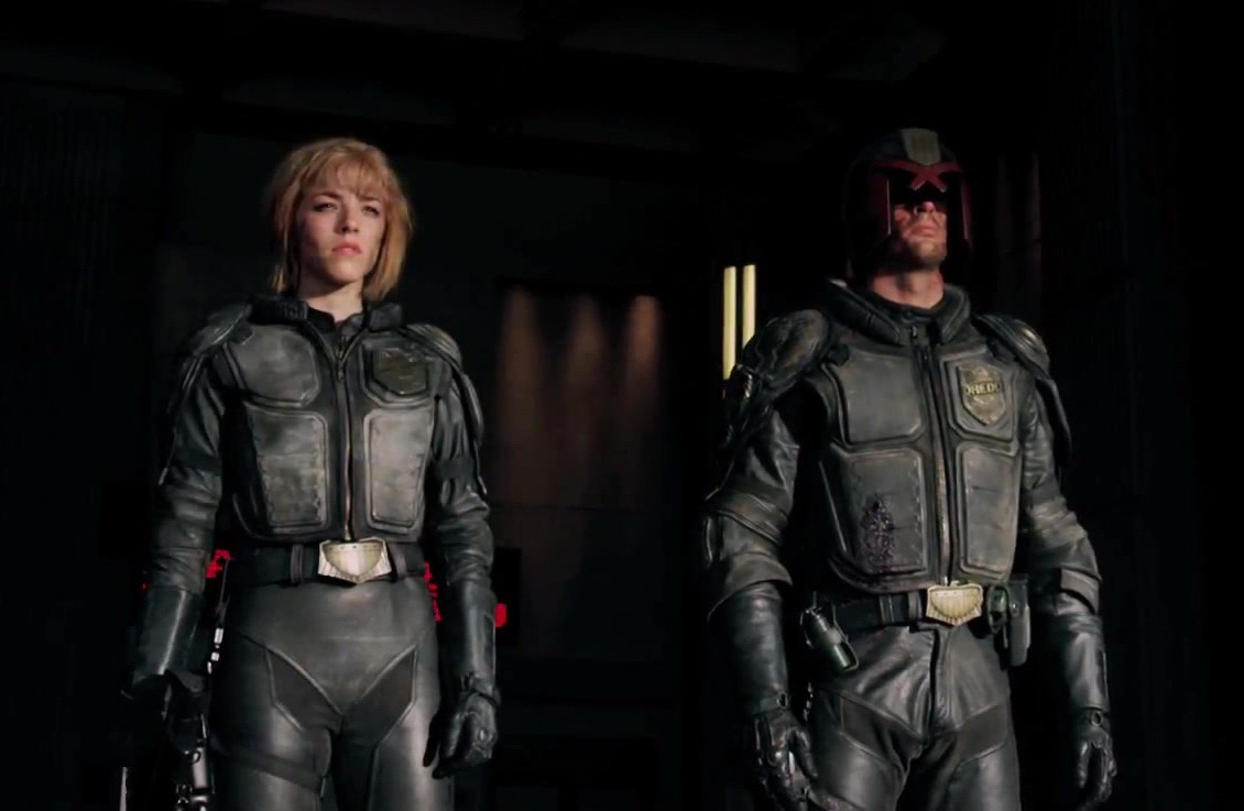 Judge Anderson (Olivia Thirlby) and Judge Dredd (Karl Urban) in Dredd (2012)