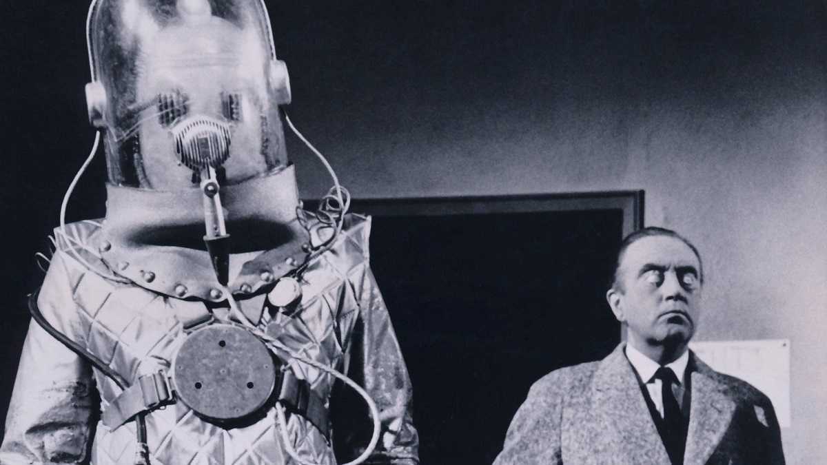 The invading alien robots and a mind-controlled Dennis Price in The Earth Dies Screaming (1964)