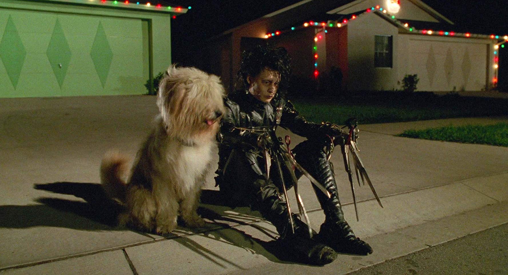 Johnny Depp as the dejected Edward - Tim Burton's quintessential alienated outsider in Edward Scissorhands (1990)