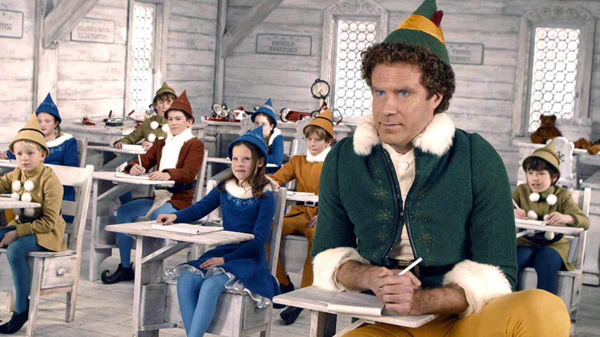 Buddy (Will Ferrell) among the other elves at the North Pole in Elf (2003)