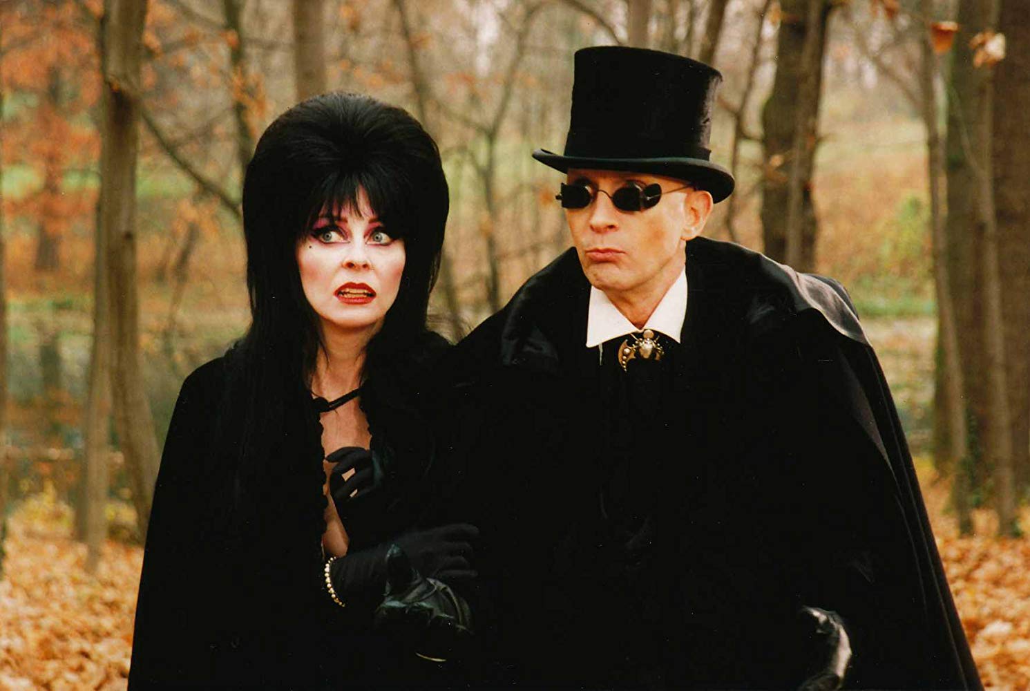 Elvira and Lord Vladimere Hellsubus (Richard O'Brien) in Elvira's Haunted Hills (2001) 