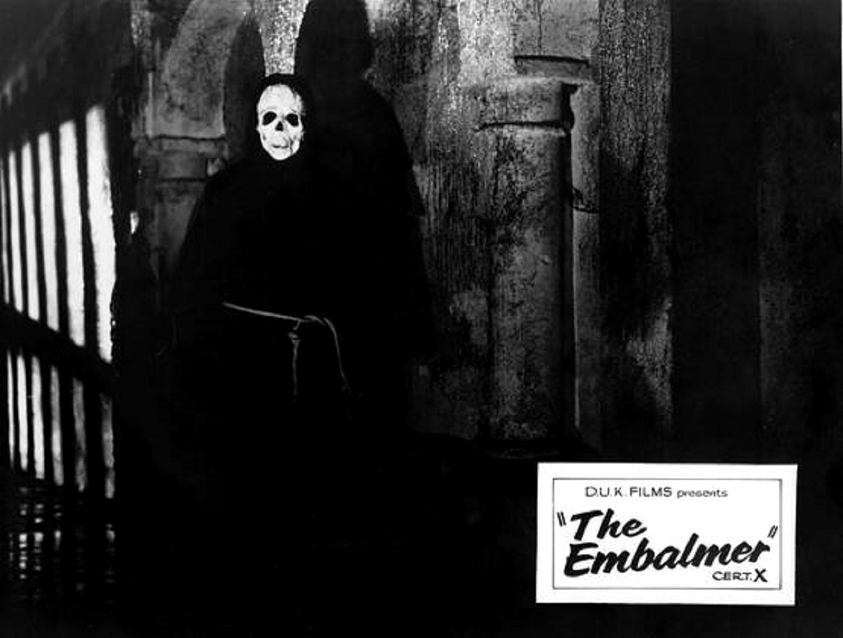 The hooded killer stalks the catacombs beneath Venice in The Embalmer (1965)