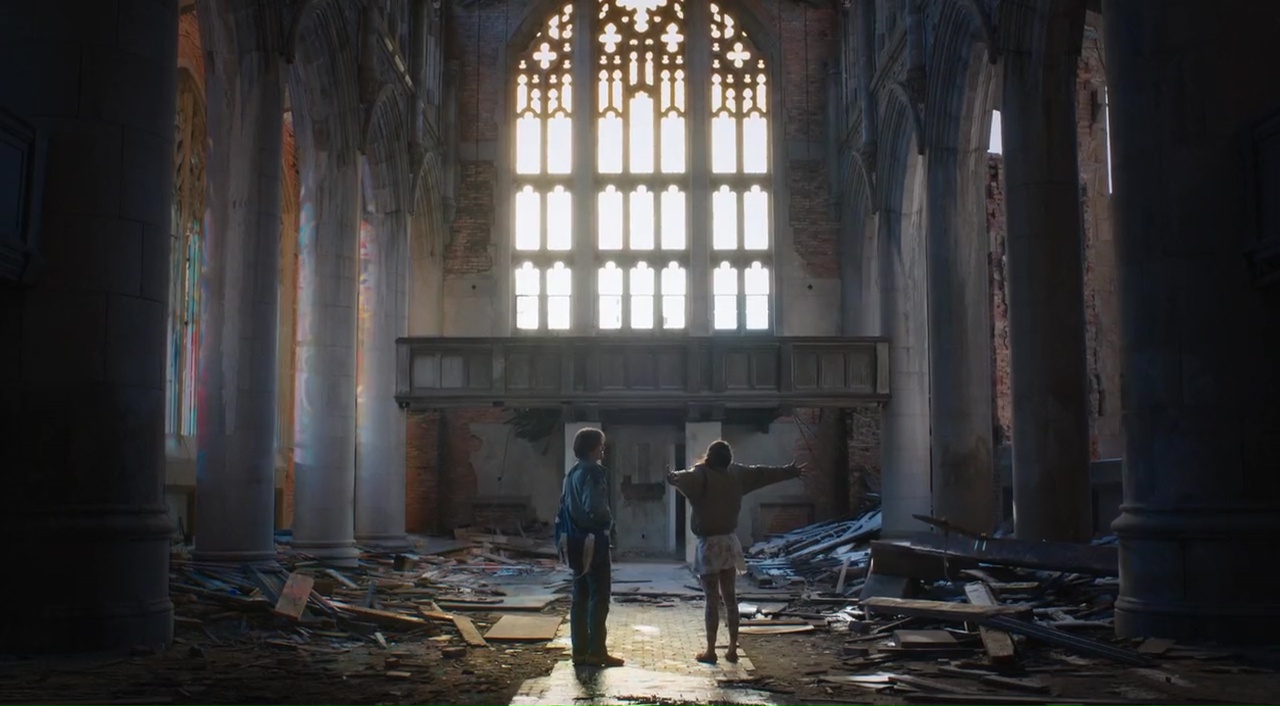 Jason Ritter and Iva Gocheva in the ruins of a church in Embers (2015)