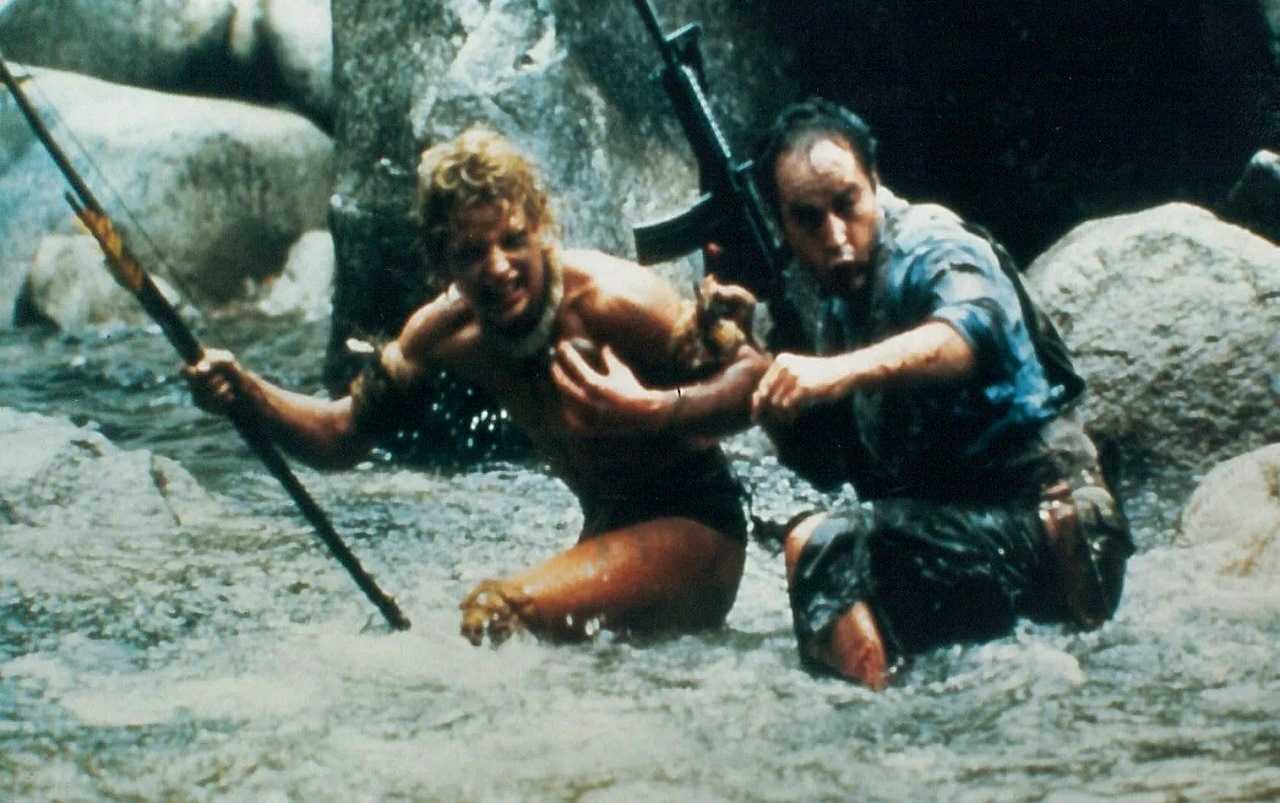 Tommy (Charley Boorman) and his father Powers Boothe in The Emerald Forest (1985)