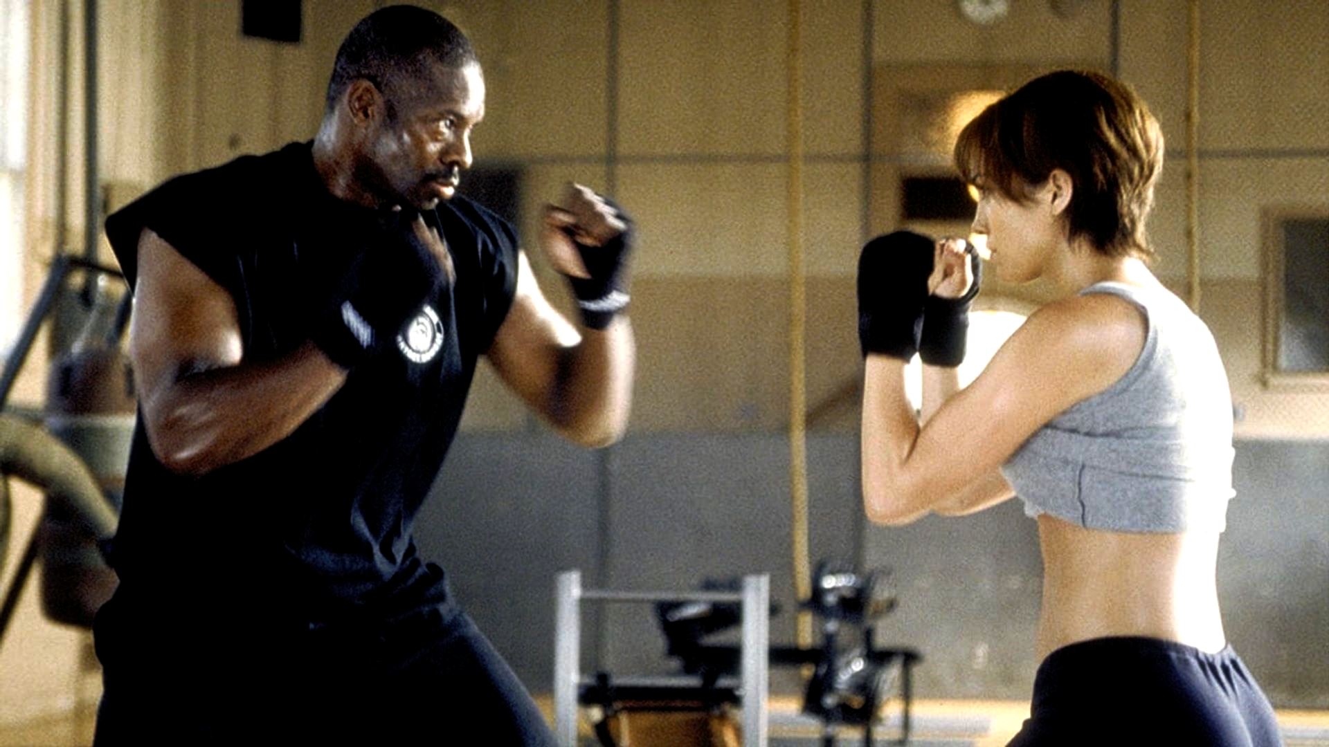 Jennifer Lopez takes self-defence classes from Bruce A. Young in Enough (2002)