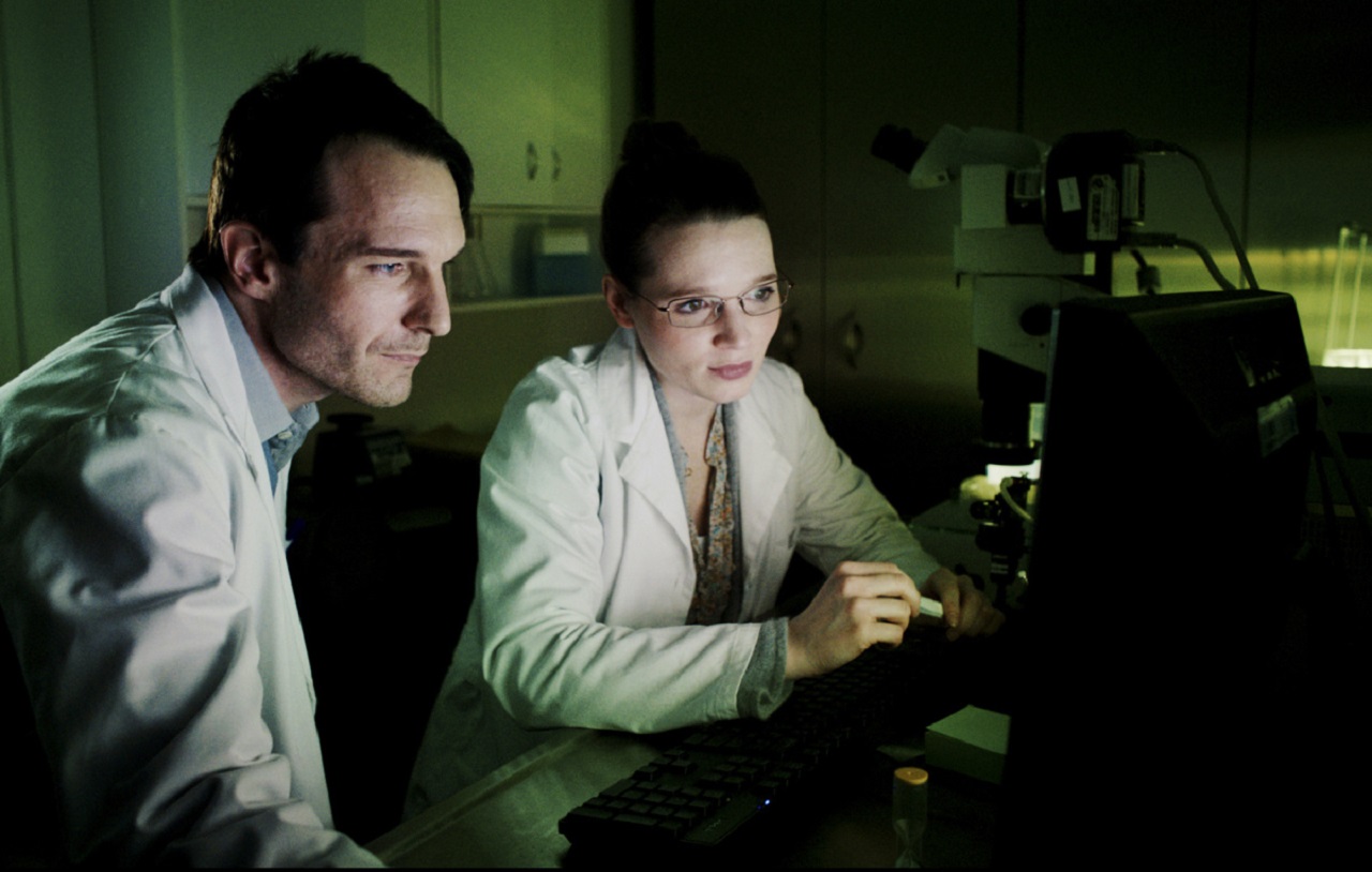 Michael Eklund and Karoline Herfurth at work in the laboratory in Errors of the Human Body (2012)