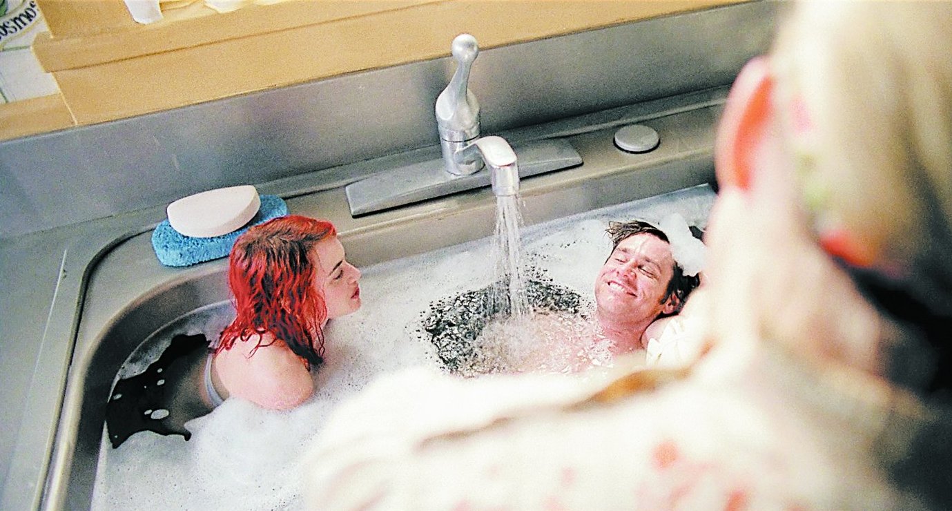 Kate Winslet and Jim Carrey try to hide from erasure in his childhood memories in Eternal Sunshine of the Spotless Mind (2004)