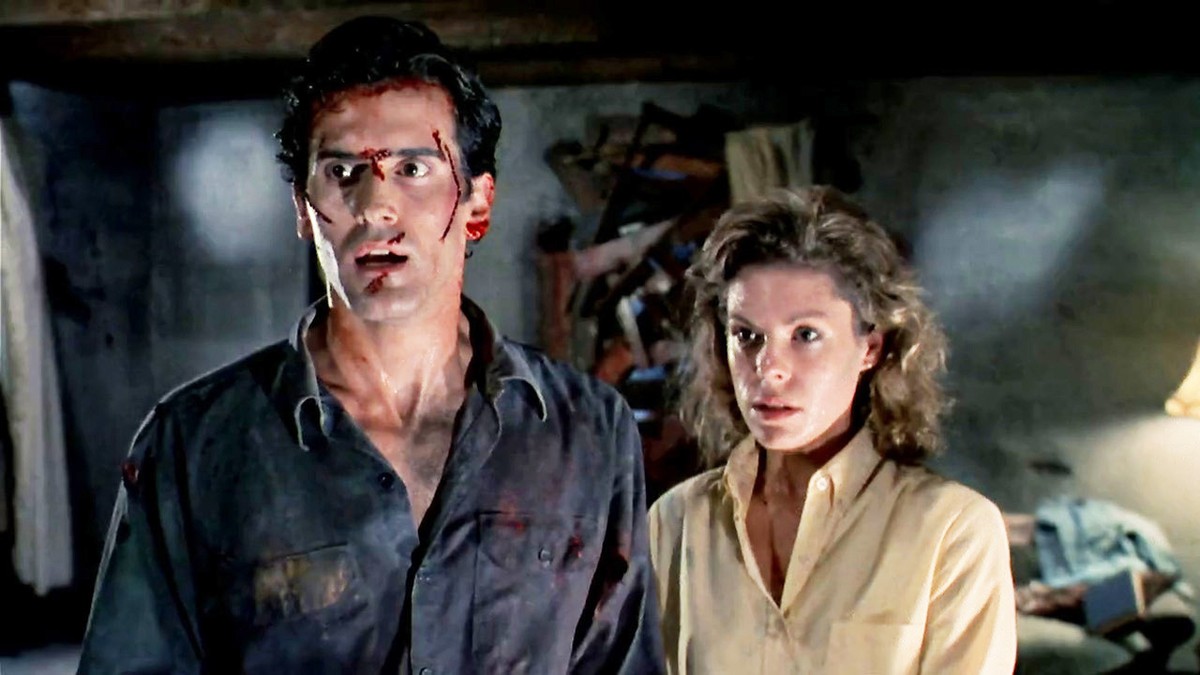 Bruce Campbell and Sarah Berry in Evil Dead II (1987)