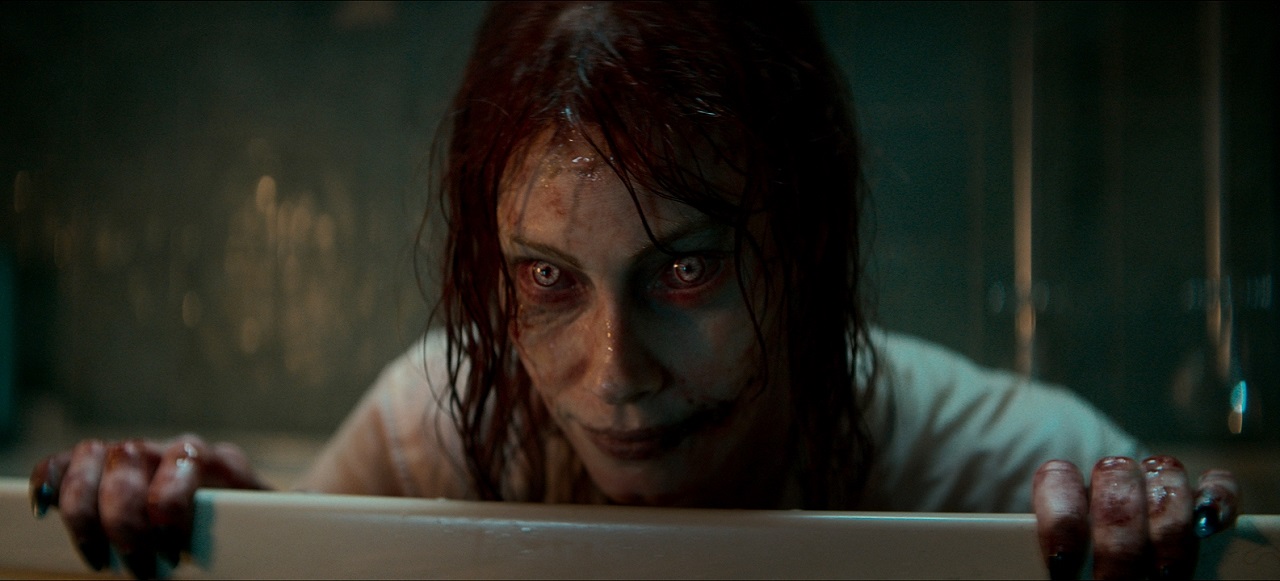 A possessed Alyssa Sutherland in Evil Dead Rise (2023)