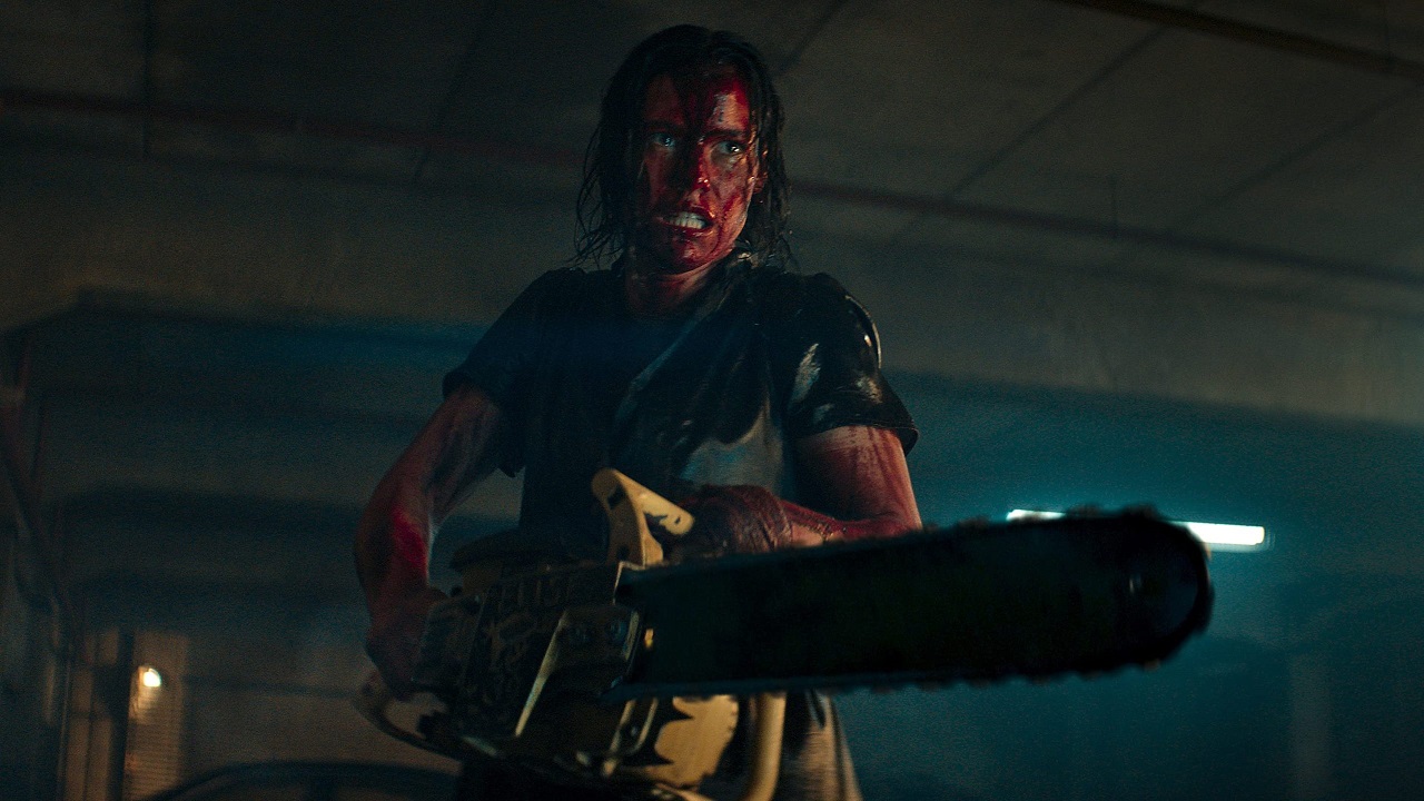 Lily Sullivan picks up the chainsaw in Evil Dead Rise (2023)