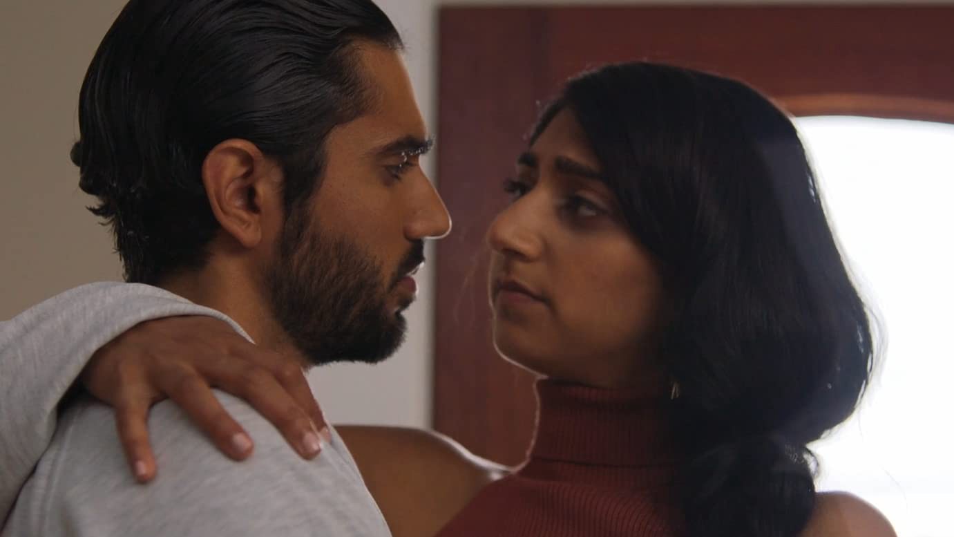 Sandeep (Omar Maskati) and Pallay (Sunita Mari) in Evil Eye (2020)
