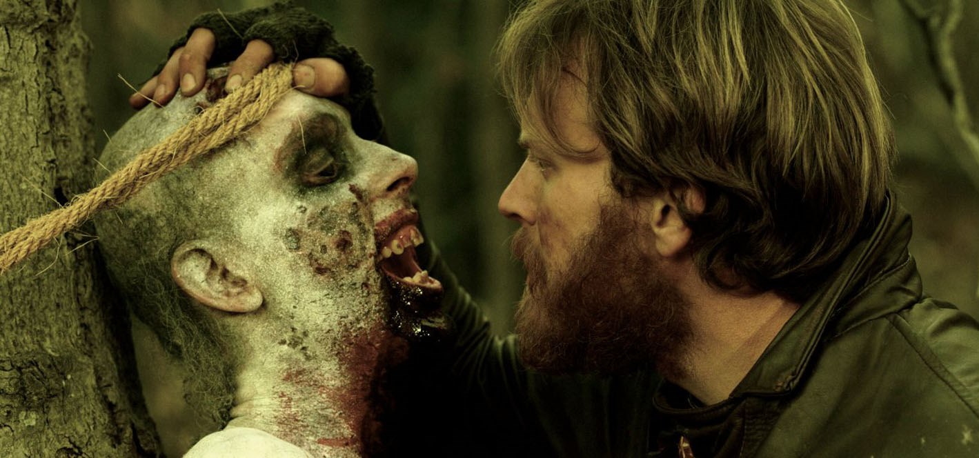 Edward Young (Mark Gibson) and zombie in Exit Humanity (2011)