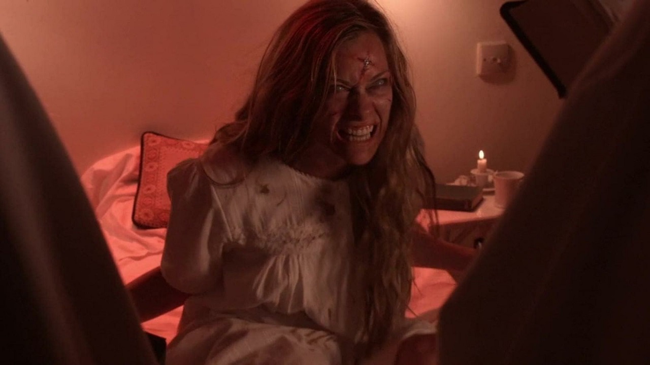 A possessed Tiffany Ceri in The Exorcism of Anna Ecklund (2014)