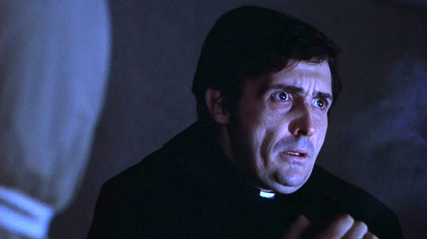 Jason Miller as Father Damien Karras, troubled by matters of faith in The Exorcist (1973)