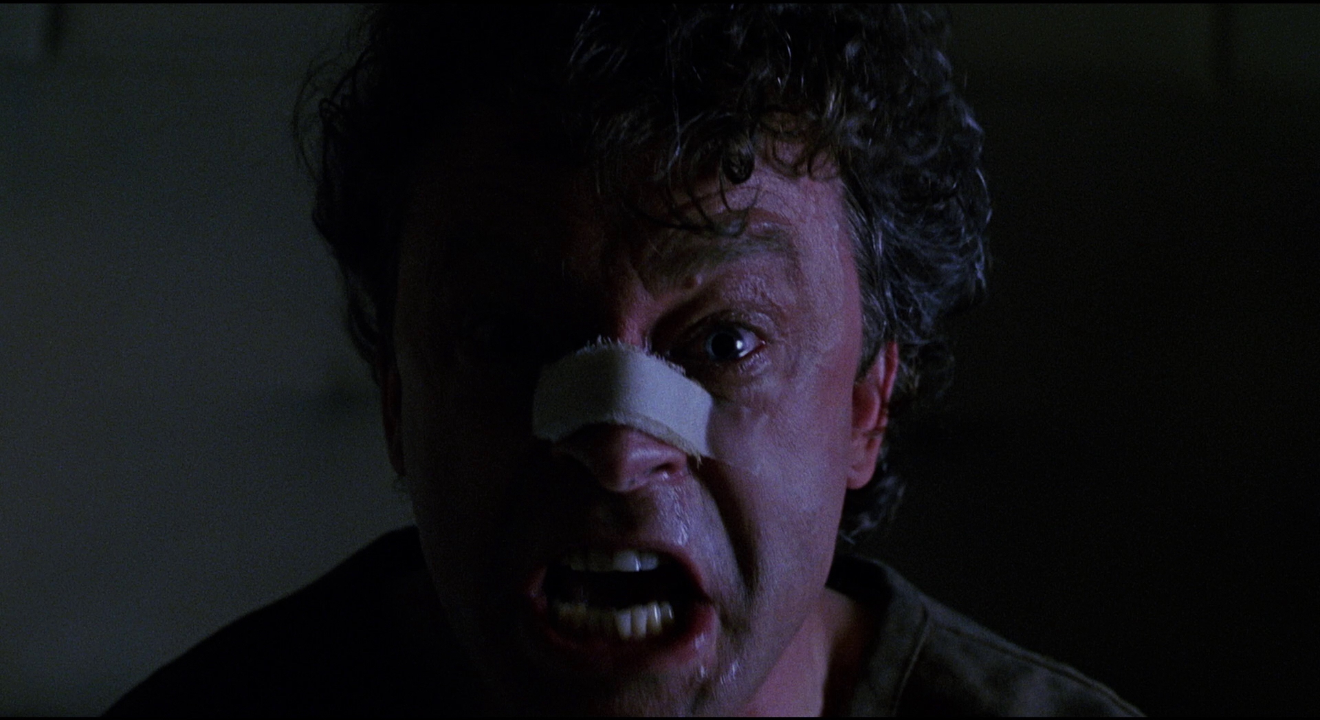 Brad Dourif as the imprisoned Gemini Killer in The Exorcist III (1990)