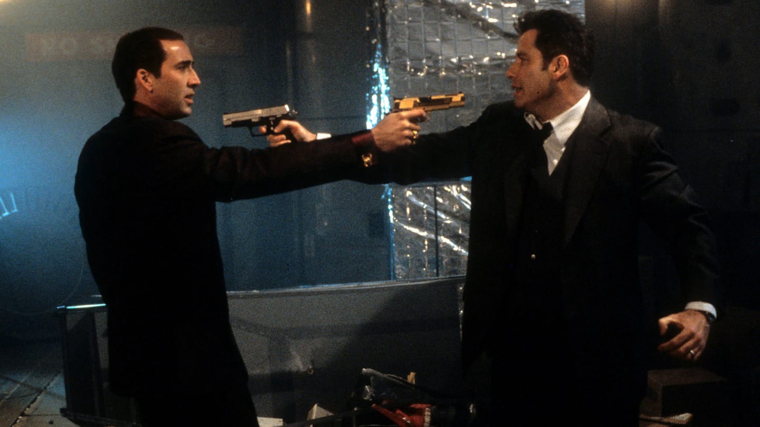 Mexican standoff between Nicolas Cage and John Travolta in Face-Off (1997)