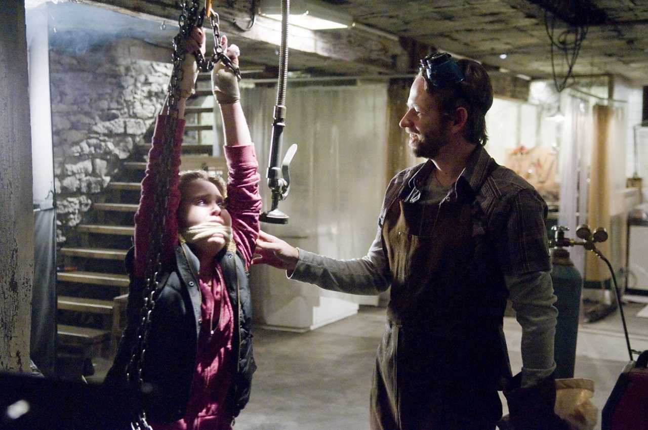 Dallas Roberts with prisoner Mae Whitman in The Factory (2012)