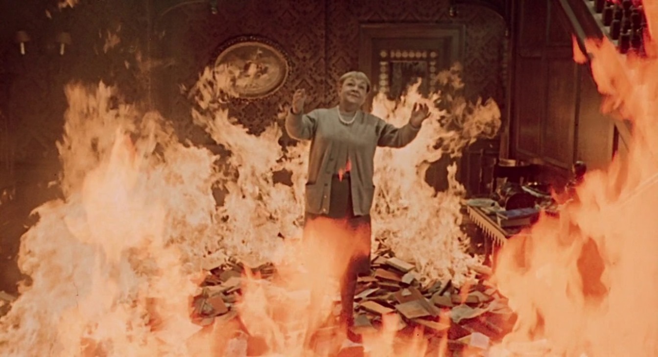 Bee Duffell chooses to be burned along with her books in Fahrenheit 451 (1966)