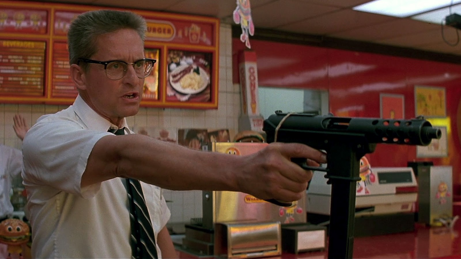 Michael Douglas wields semi-automatic weapons in a fast food restaurant in Falling Down (1993) 