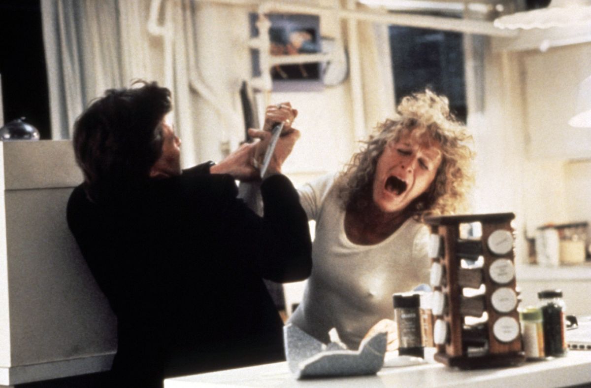 Michael Douglas fends off a knife-wielding Glenn Close in the family bathroom in Fatal Attraction (1987)