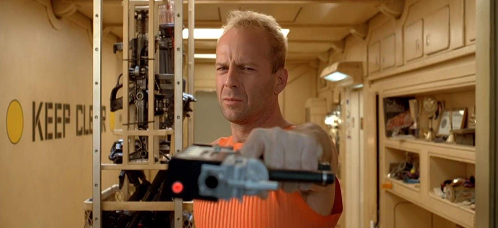 Bruce Willis as former security forces officer turned cab driver Korben Dallas in The Fifth Element (1997)