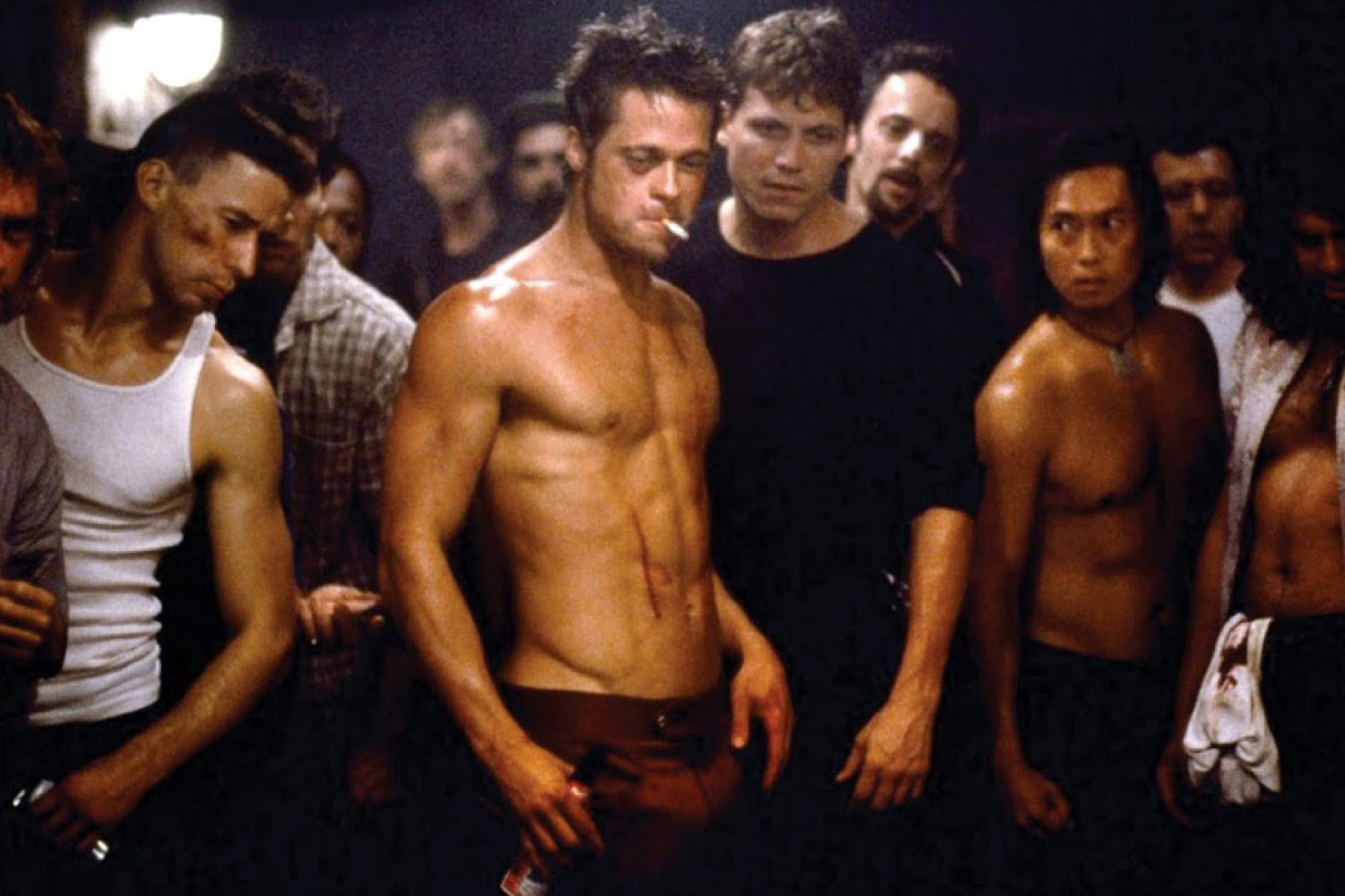 A bare-chested Brad Pitt sets out to brawl in Fight Club (1999)