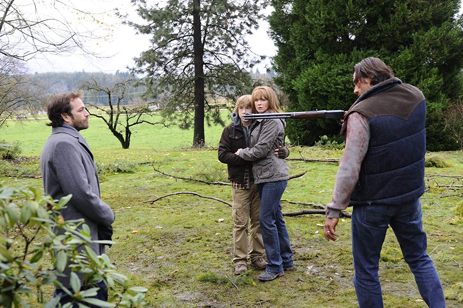 (l to r) Mysterious stranger Luke Perry, son Cole Heppell, wife Lauren Holly and husband Steve Bacic in The Final Storm (2010)