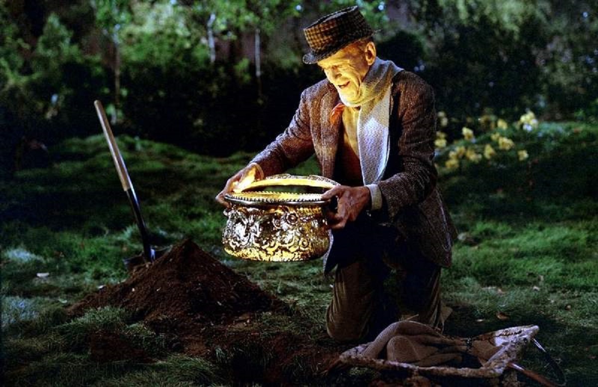 Finian McLonergan (Fred Astaire) with pot of gold in Finian's Rainbow (1968)