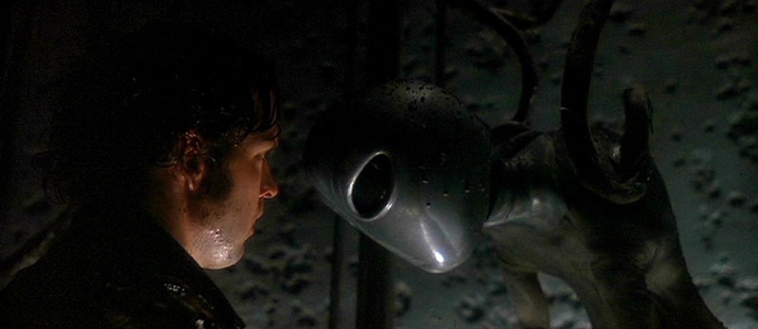 Travis Walton (D.B. Sweeney) encounters an alien in Fire in the Sky (1993)