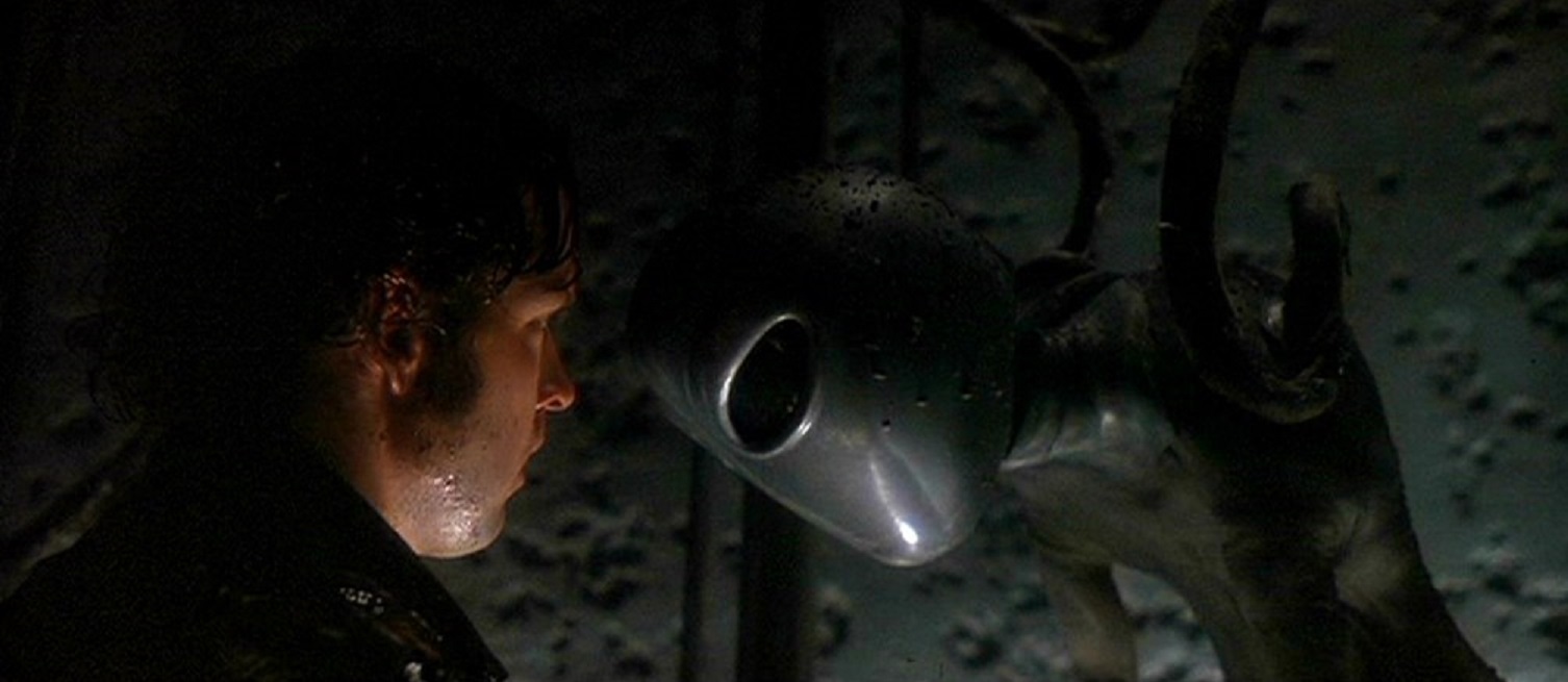 Travis Walton (D.B. Sweeney) encounters an alien in Fire in the Sky (1993)