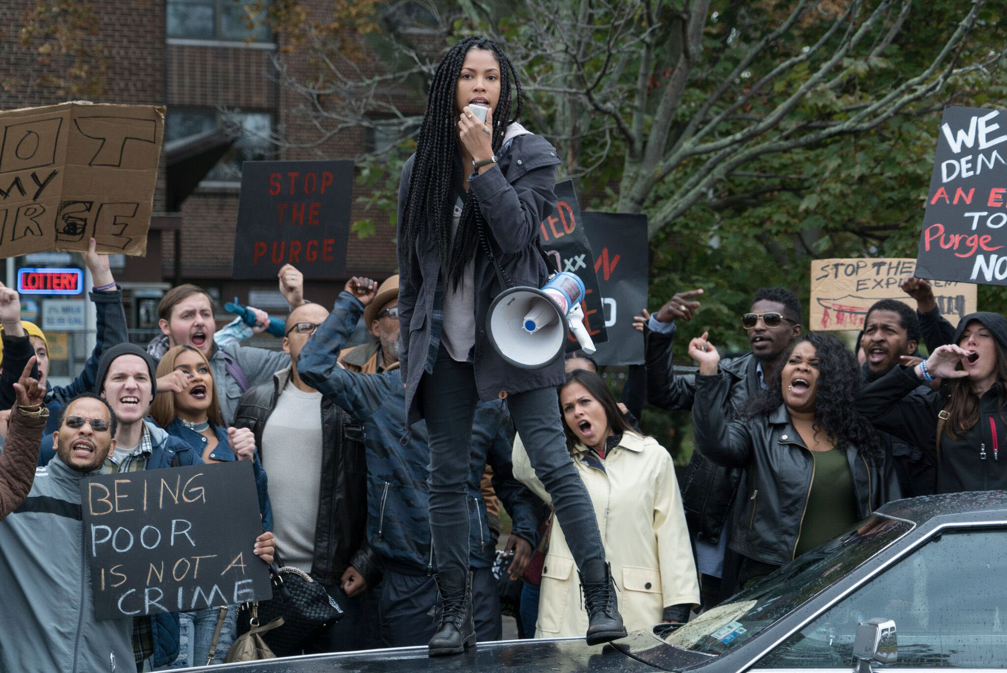 Nya (Lex Scott Davis) leads the protests - a Purge film for the era of Black Lives Matter - The First Purge (2018)