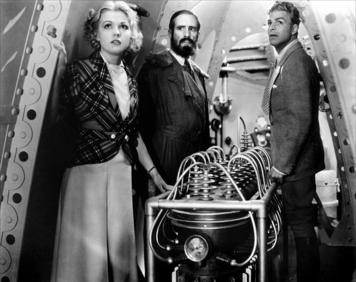 (l to r) Dale Arden (Jean Rogers), Dr Zarkov (Frank Shannon) and Flash Gordon (Larry ‘Buster’ Crabbe) in Flash Gordon (1936)