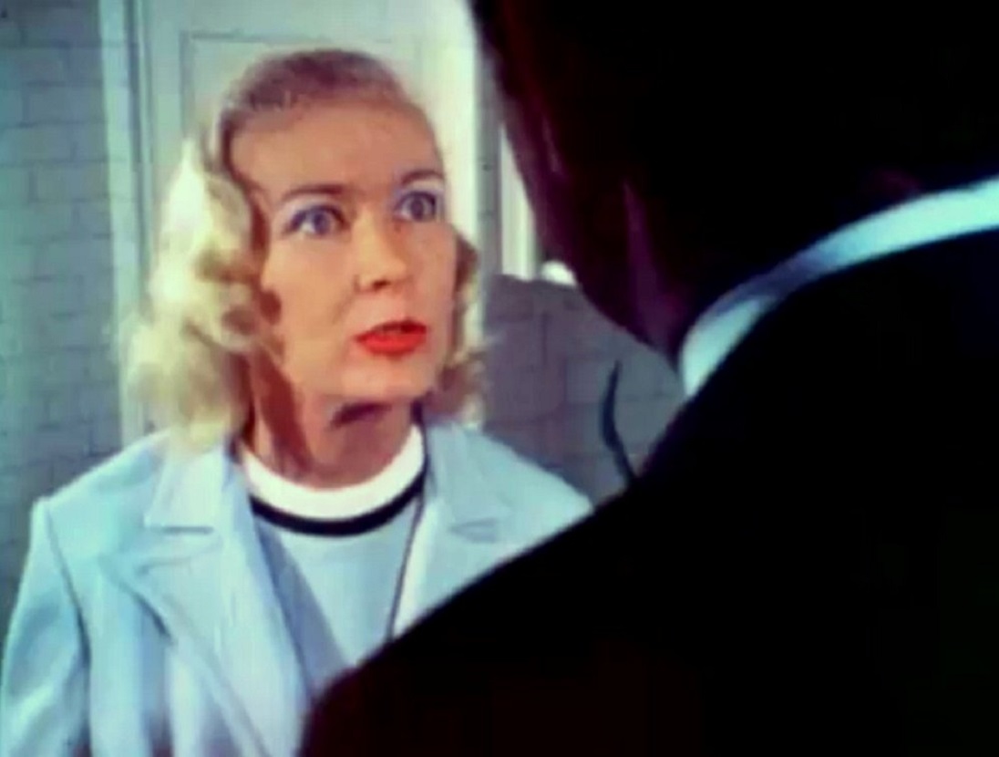 Veronica Lake as a Nazi mad scientist in Flesh Feast (1970)