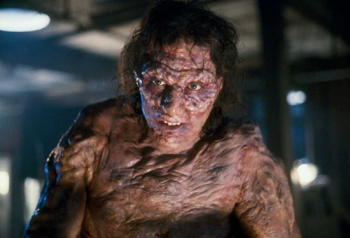 Seth Brundle (Jeff Goldblum) starts to mutate into a fly hybrid in The Fly (1986)